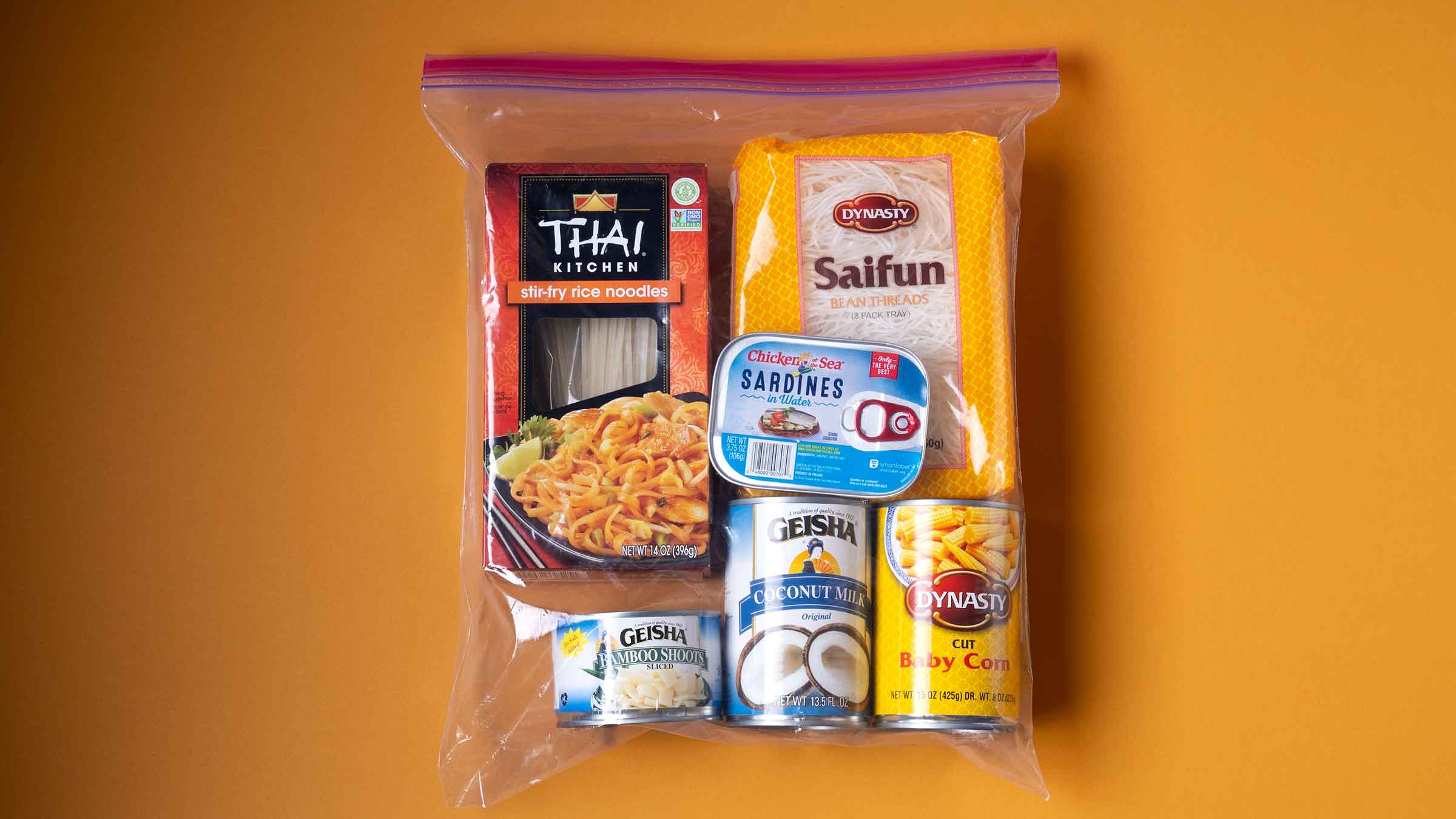 A Ziploc bag is filled with various food items that are staples in the eastern Asian diet