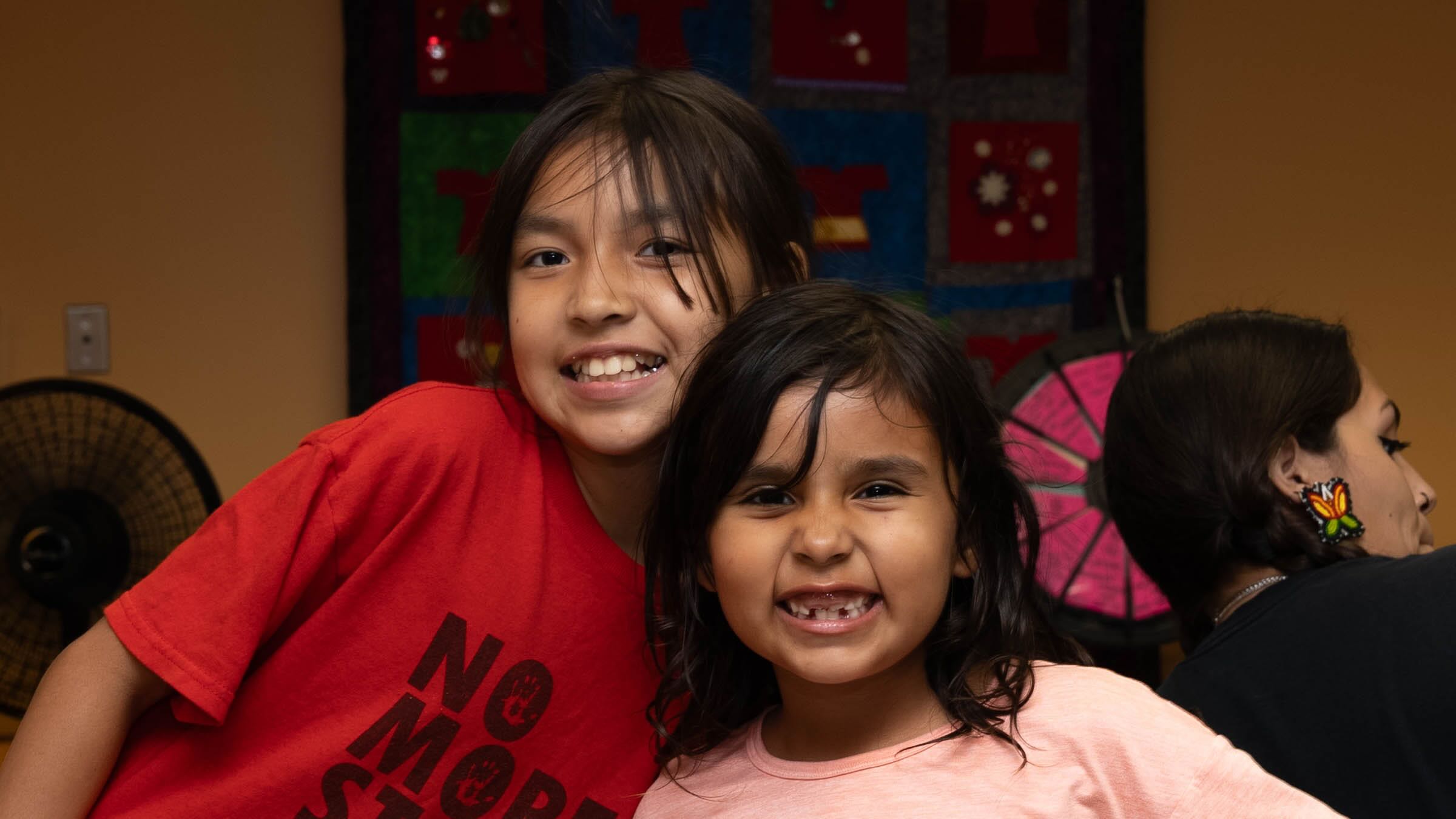 Smiling youth at Division of Indian Work event.